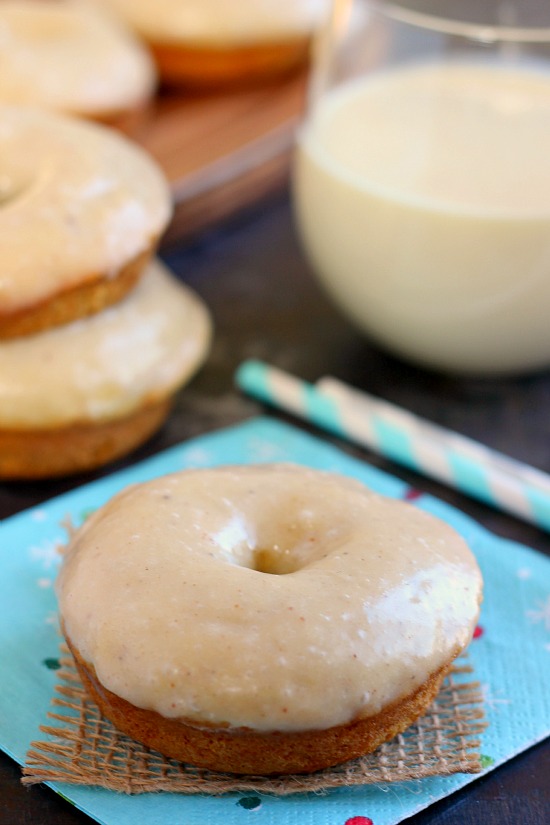 These Glazed Eggnog Donuts bake up soft, fluffy and are filled with a sweet eggnog and hints of nutmeg. They're easy to whip up and make the perfect breakfast or dessert for the holidays!