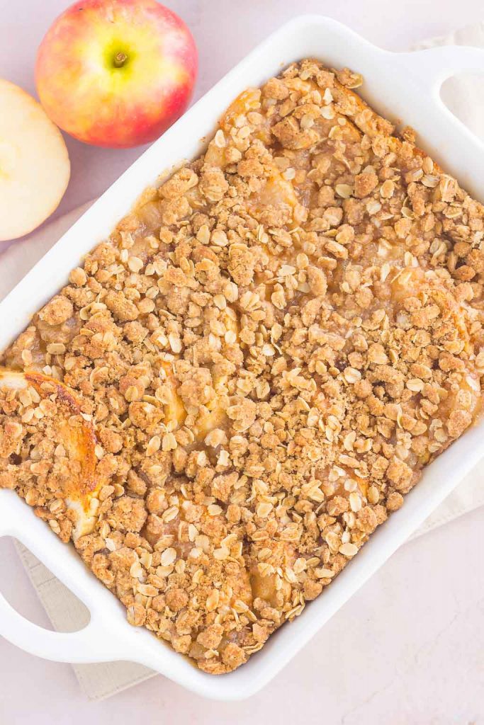 overhead shot of a baked french toast casserole in a white dish