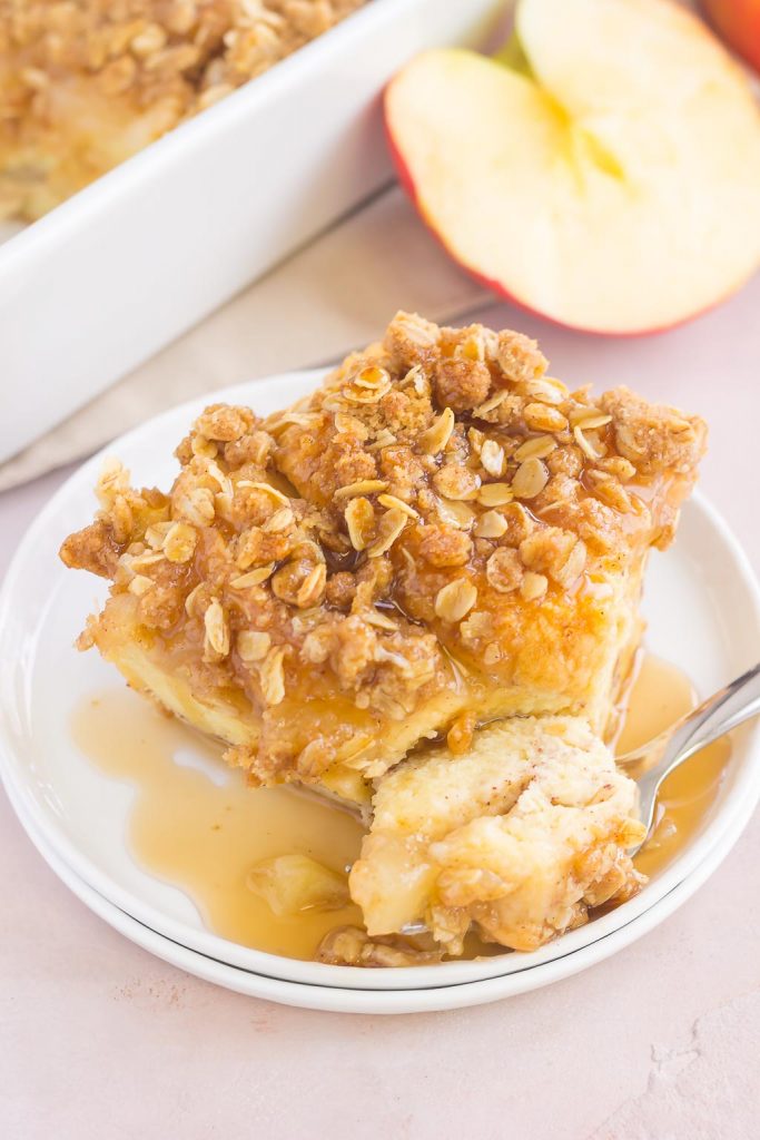 a piece of apple french toast casserole with a spoon