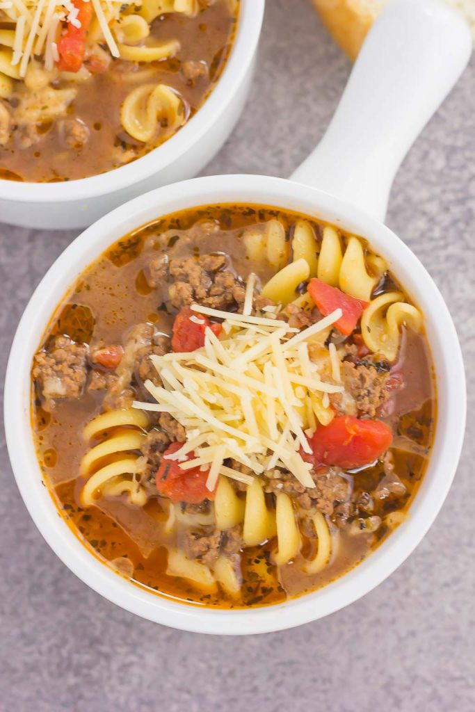 top down view of lasagna soup in a white bowl