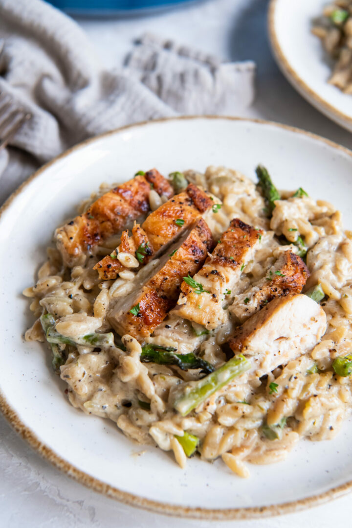 pasta and chicken on a white plate