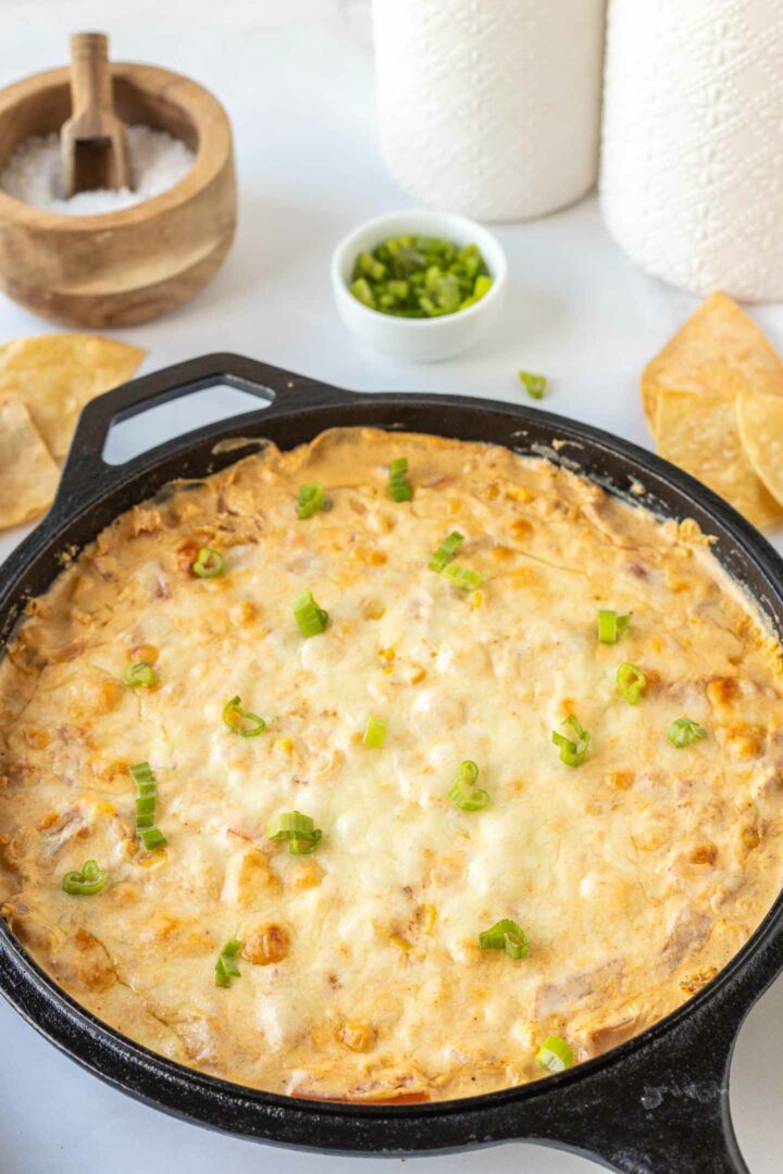 corn dip in a black skillet