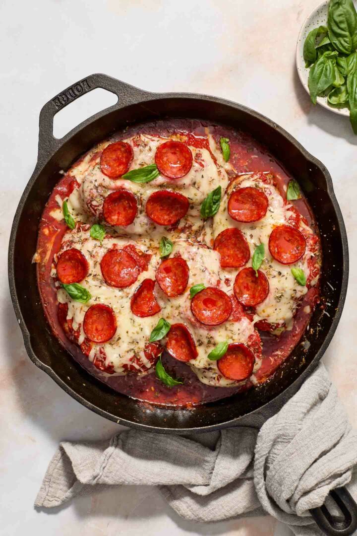 pizza chicken in a black skillet