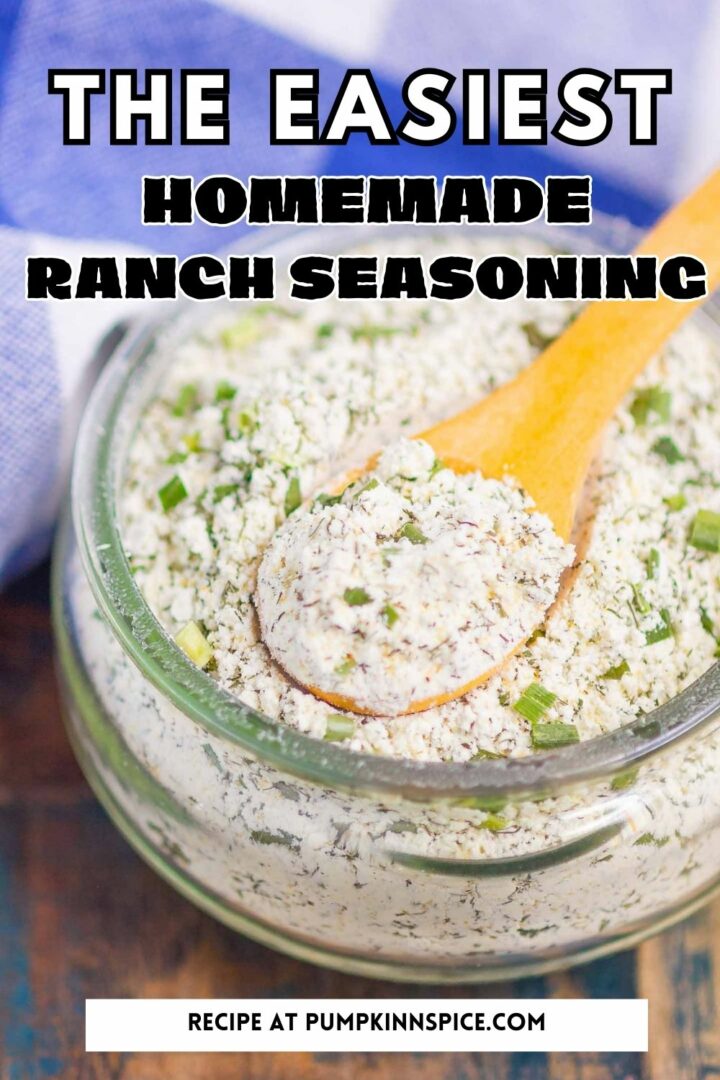 ranch seasoning mix in a glass jar with a wooden spoon