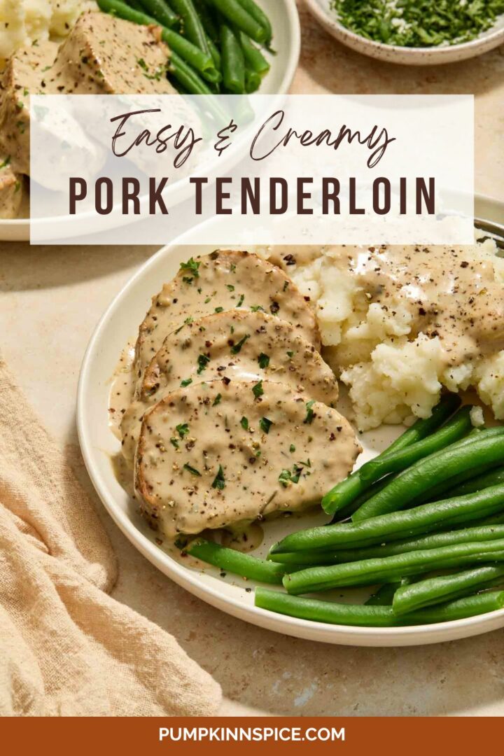 pork tenderloin with cream sauce on a white plate with mashed potatoes and green beans