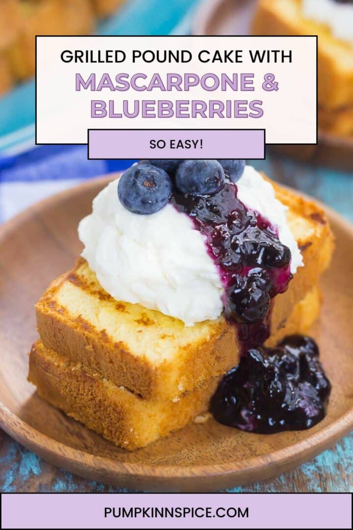 two slices of pound cake with mascarpone and blueberry sauce on a wooden plate