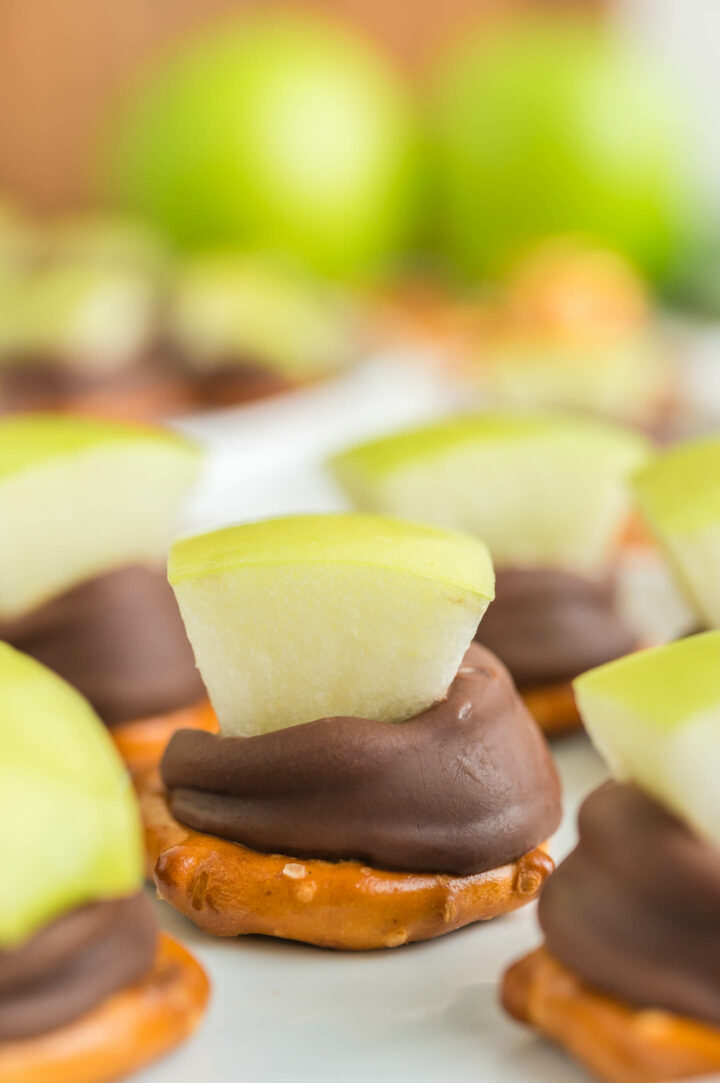 apple pretzel bites on a white surface