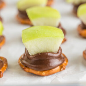 apple pretzel bites on a white surface