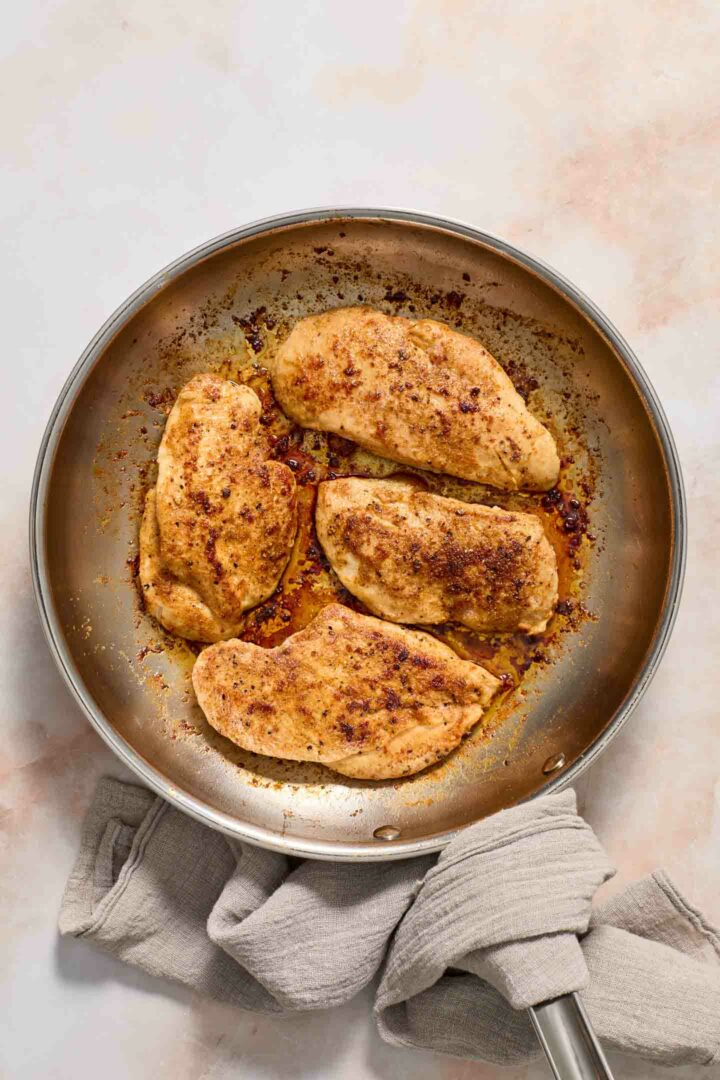 chicken seared and cooked in a skillet