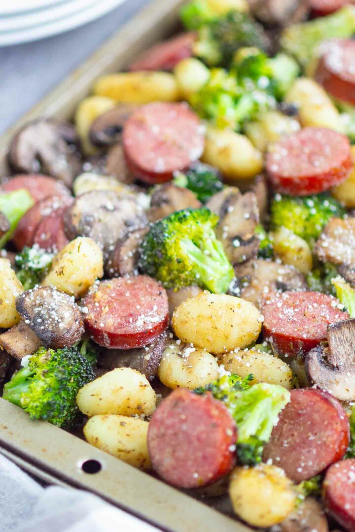 sausage, gnocchi, broccoli, mushrooms on a sheet pan