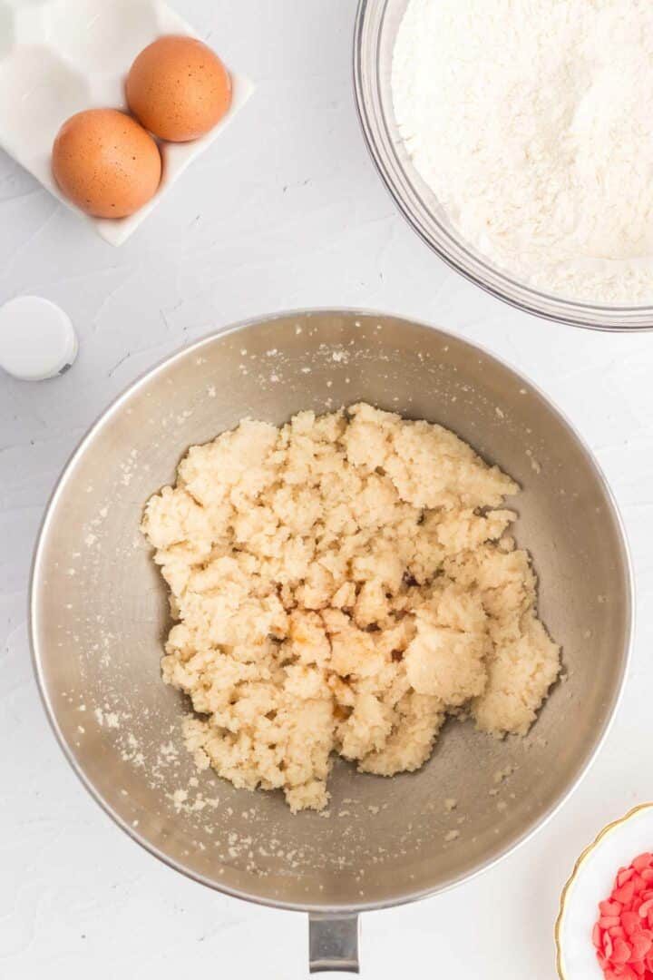 cookie dough mixed in a metal bowl