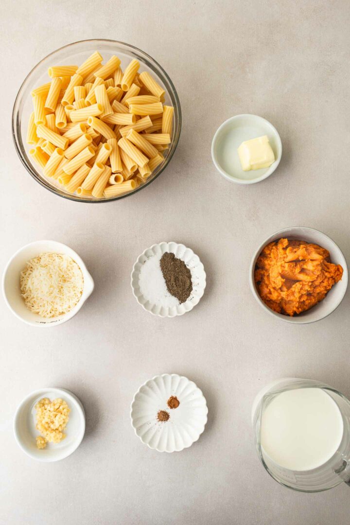 pumpkin alfredo pasta ingredients in small white bowls