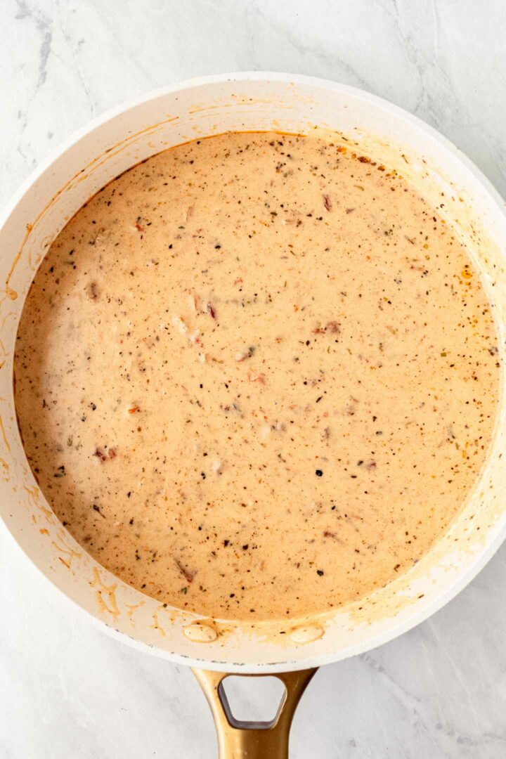 cream sauce in a white skillet