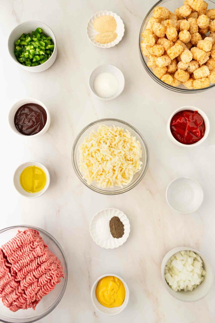 sloppy joe casserole ingredients in small bowls