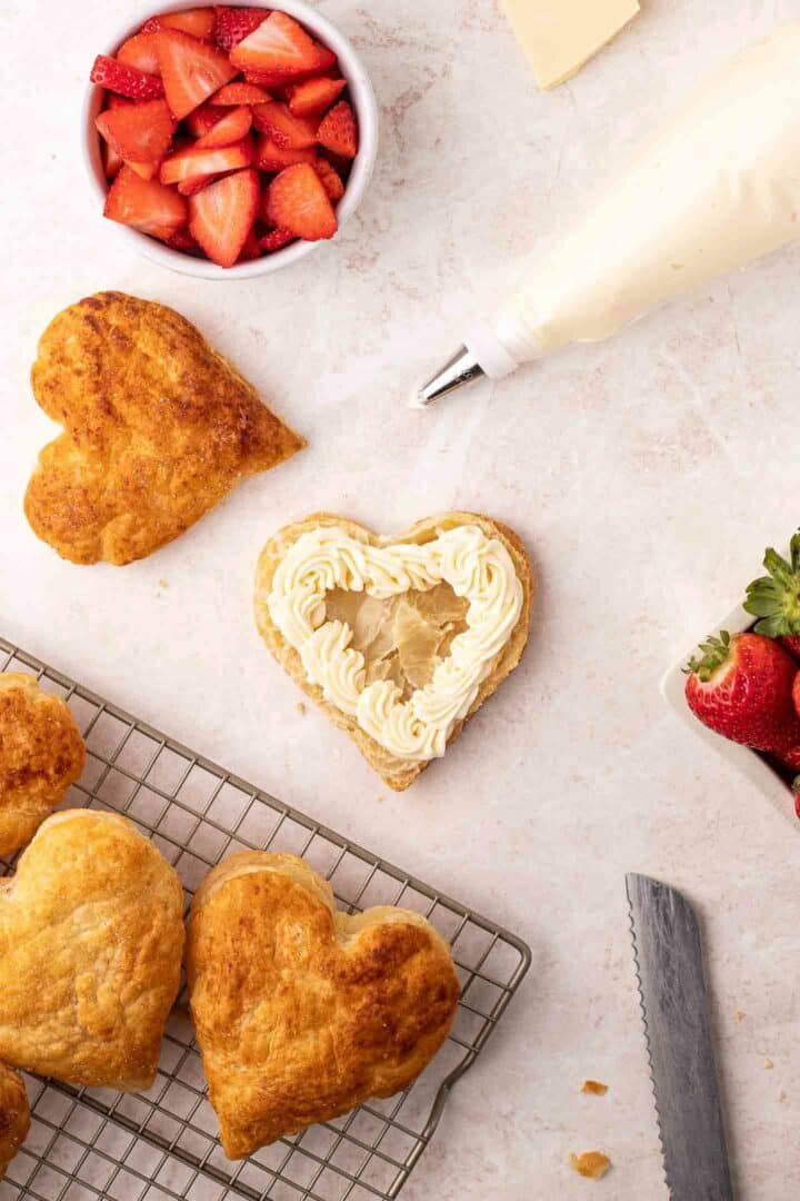 white chocolate mousse piped onto a puff pastry heart