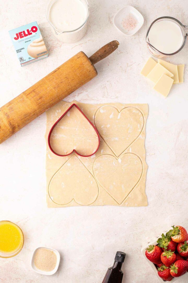 heart shapes cut from puff pastry dough