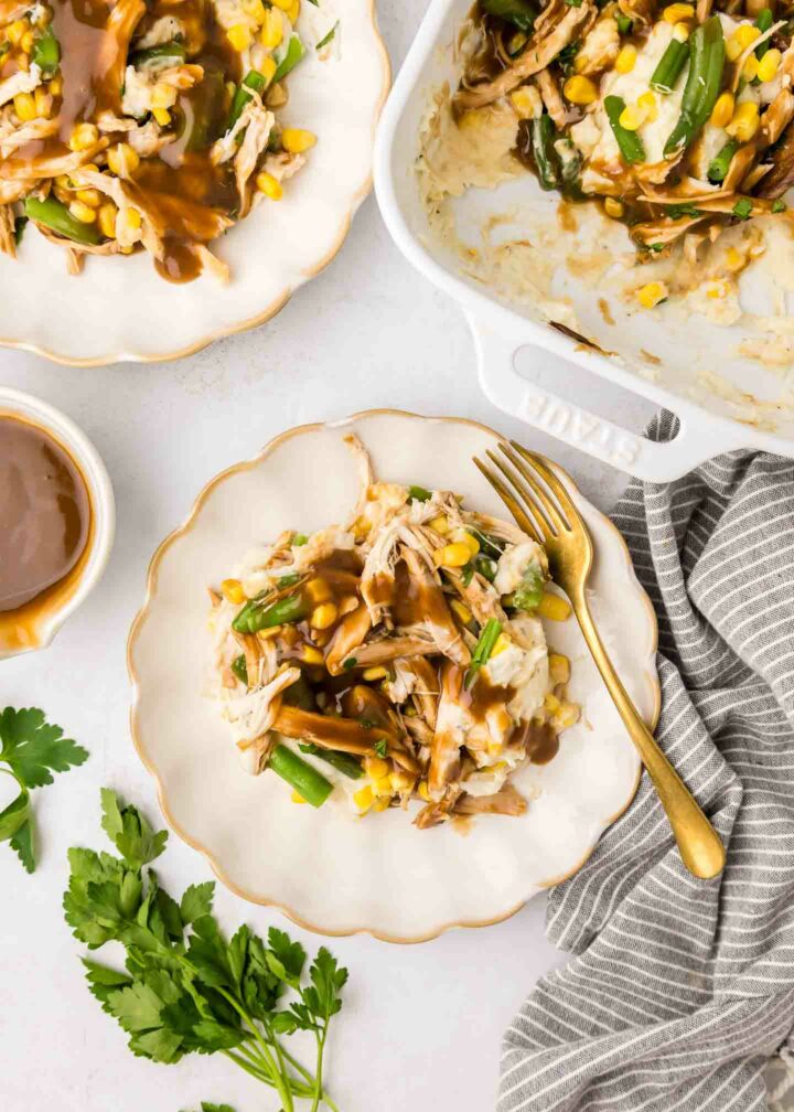 casserole on white plates with a fork